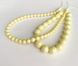 Жемчуг Swarovski, круглый (5810), цвет - Сrystal Pastel Yellow, 5 мм