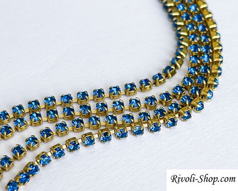 Стразовая цепь Preciosa, ss 6,5 (1.5-1,8 мм), цвет Capri Blue / латунь, 10 см