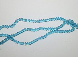 Кришталеві ронделли 6*4 мм, блакитні прозорі