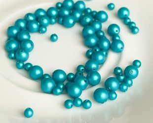 Перлина Swarovski, кругла (5810), колір - Iridescent Dark Turquoise, 4 мм