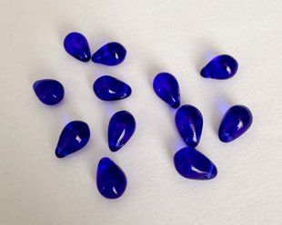 Скляна підвіска, Чехія, 6*9 мм, насичений синій (Majestic Blue) прозорий (30080), штука