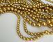 Перлина Swarovski, кругла (5810), колір - Royal Gold, 4 мм 1 з 2