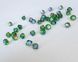 Биконус Swarovski (5328), цвет - Dark Moss Green Shimmer 2X, 3 мм
